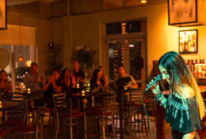 girl singing at open mic night