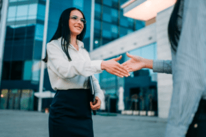 woman shaking hands with someone