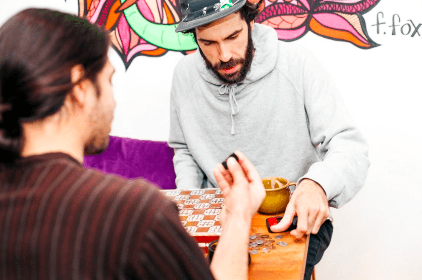 people playing board games