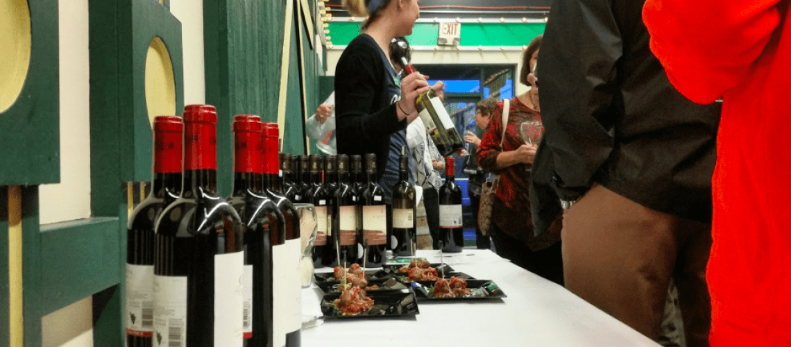 pouring wine at a tasting event